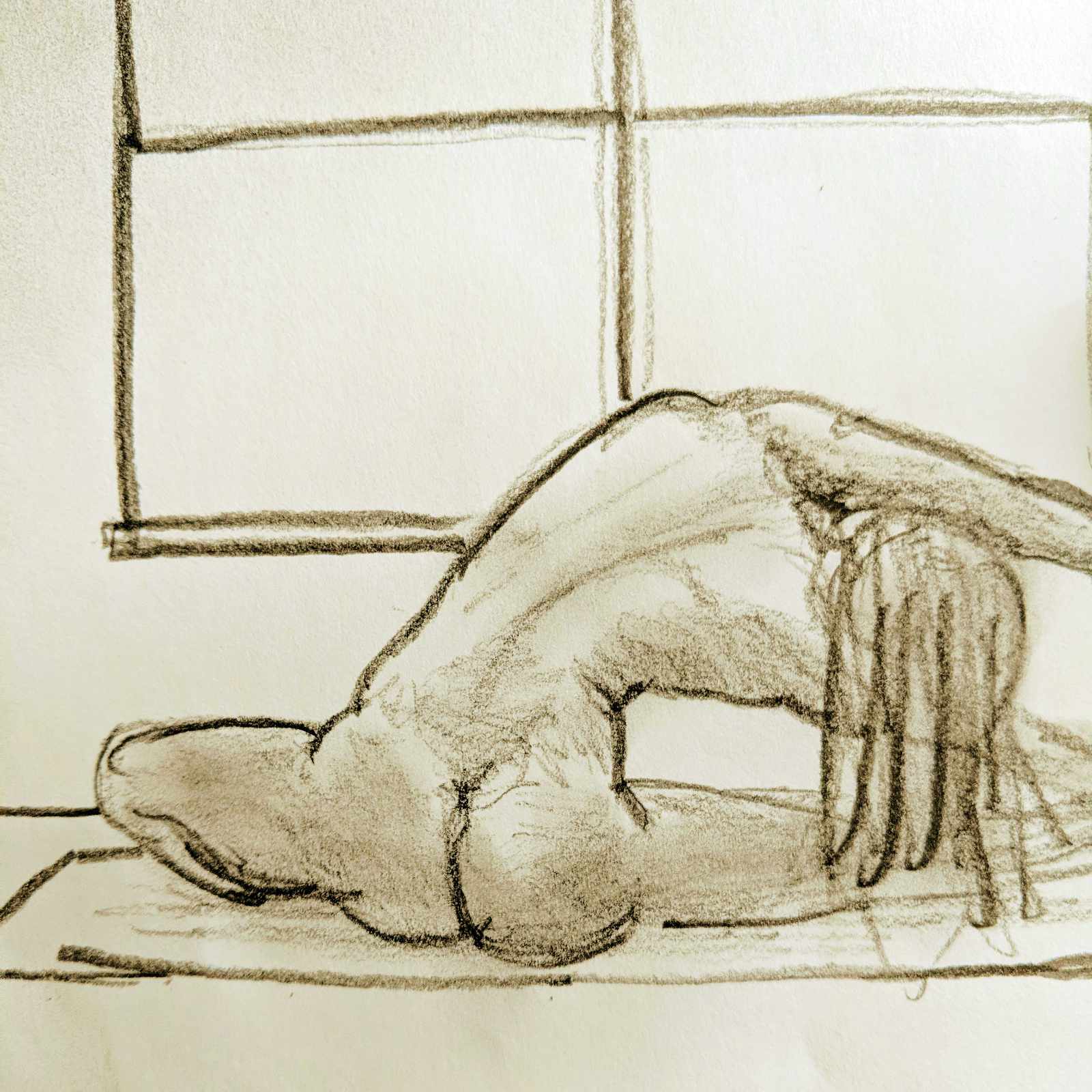 Charcoal drawing of a woman doing yoga.